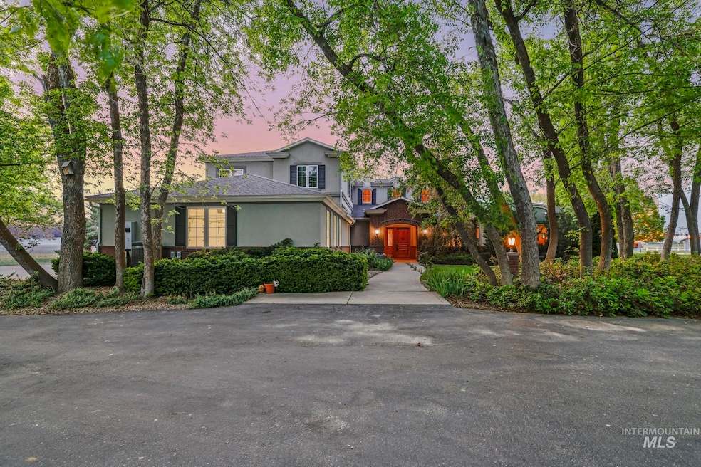 View of front of house featuring stucco siding