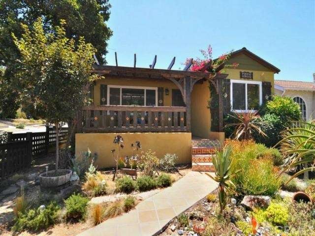 Front of home with tile walk way.