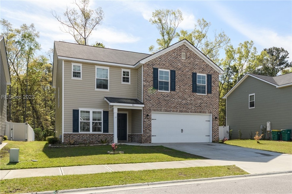This 4 BR home is offers the beautiful brick accen