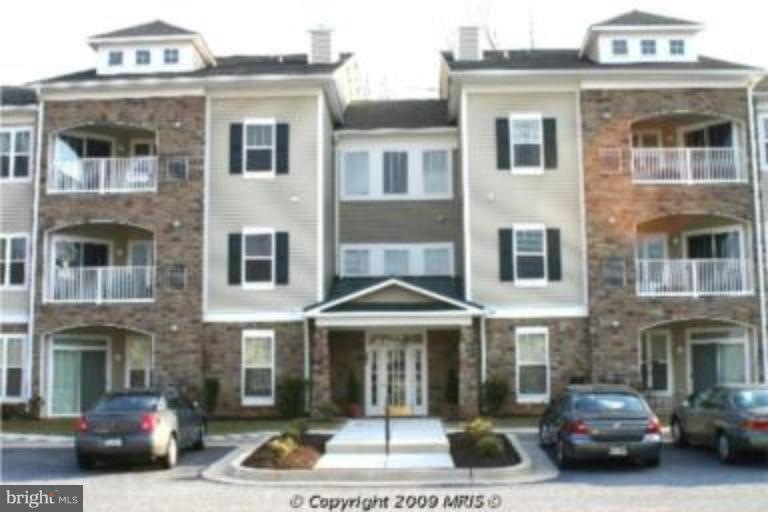 302 Wyndham Cir unit 302 A, Owings Mills, MD 21117 - photo 1