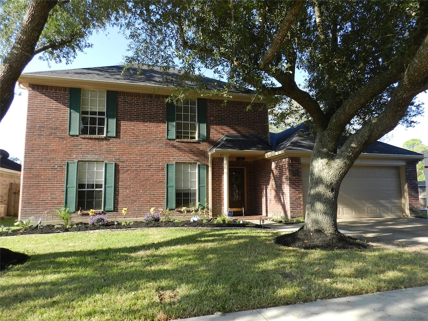 Beautiful mature oak trees to shade the home.