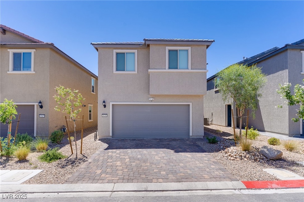 View of front of property featuring stucco siding,