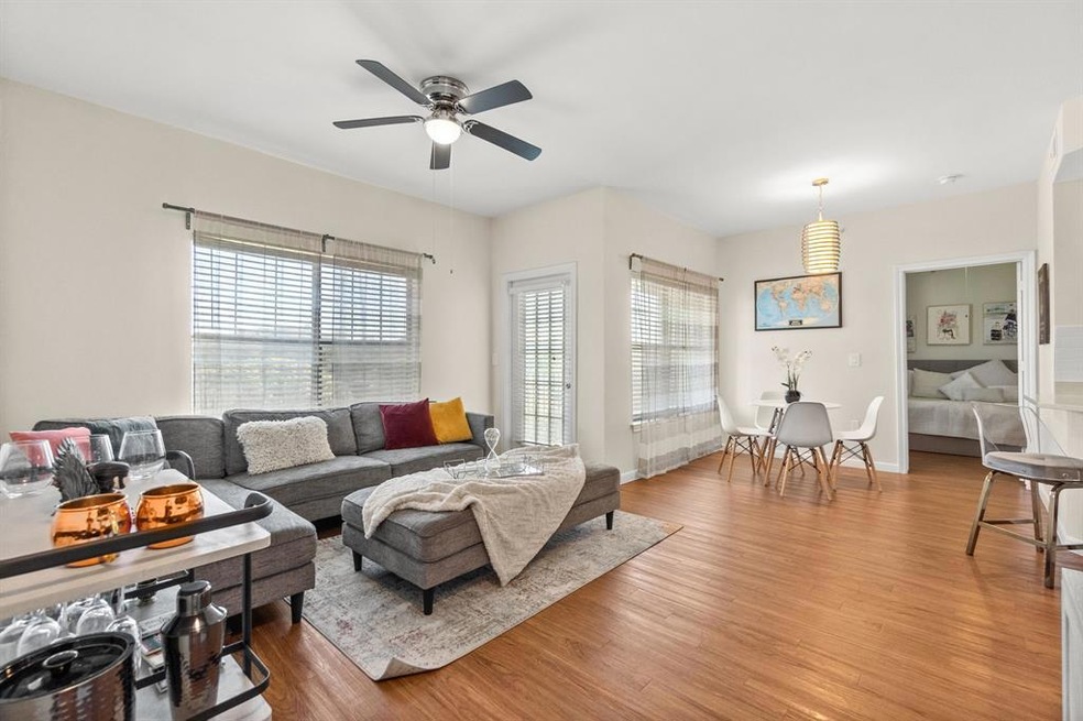 This condo boasts an open-concept design that is p