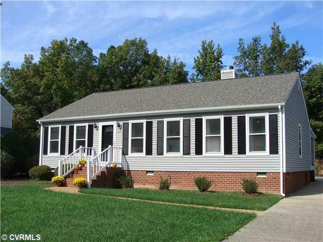 Exterior Front - Vinyl sided Ranch with new dimens