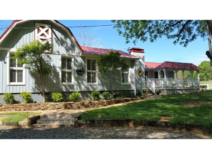 Bungalow Styled Home Featuring 16 Acre Horse Farm 