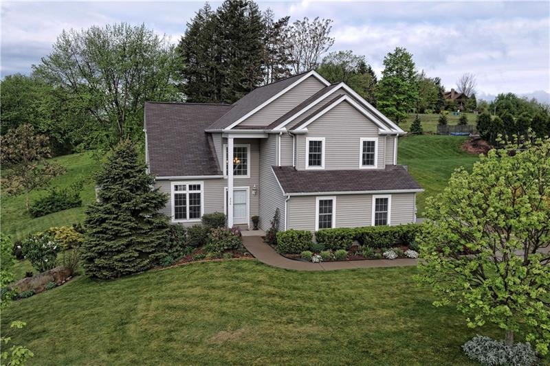 Welcome to 236 Dogwood Circle!  This striking cust