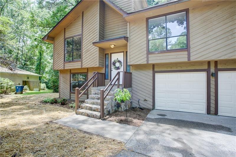 Front view of the house.  Please not new landscape