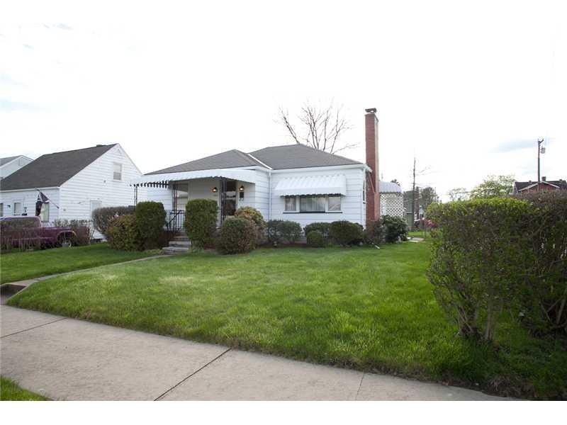 Exterior Front. Nice corner lot, well maintained y