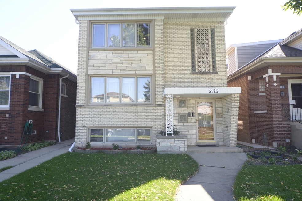 3123 N Lotus Ave unit 2, Chicago, IL 60641 - photo 1