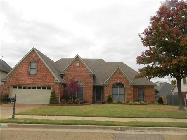 Beautiful and well-maintained brick home with five