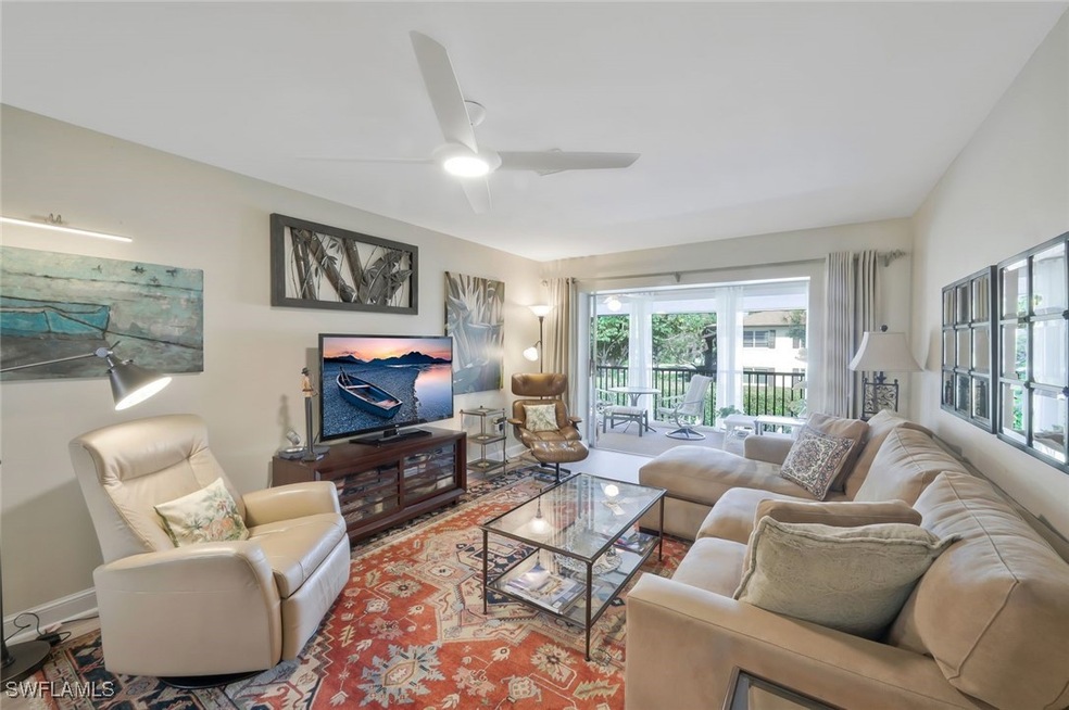 Family room with ceiling fan, luxury vinyl floors