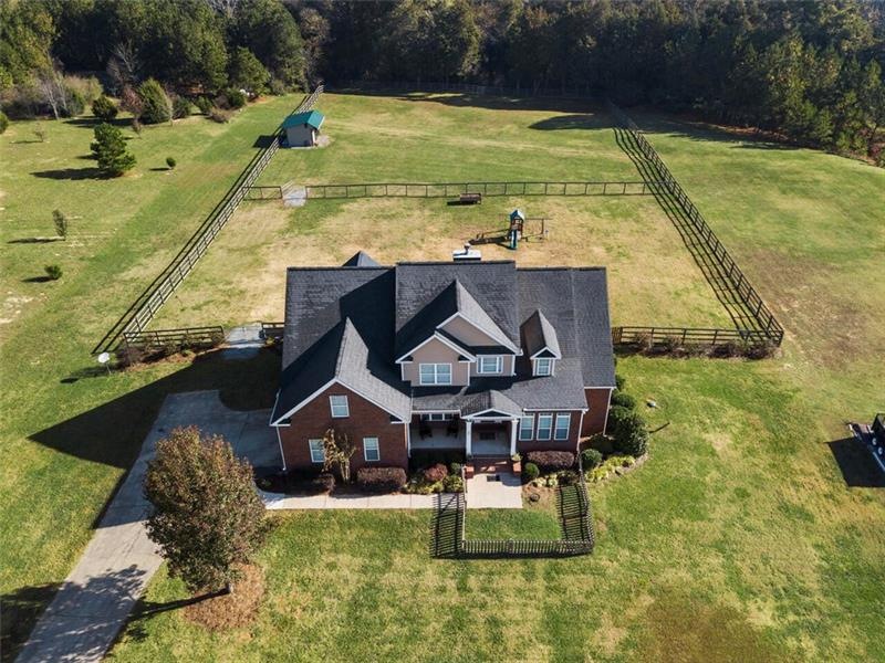 2 Level Acres and Completely Fenced.  Horse Stall 