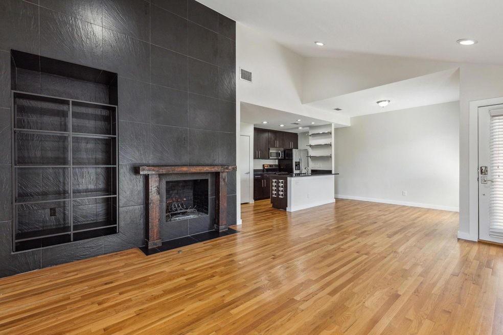 Tons of natural light and gorgeous hardwoods in op