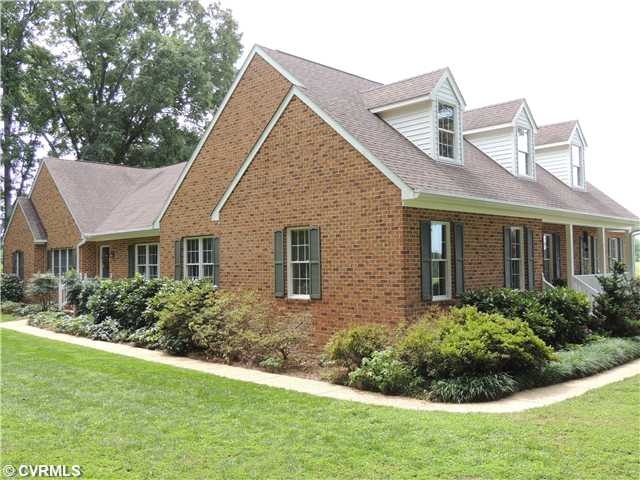 Exterior Front - STUNNING ALL BRICK HOME WITH AGGR