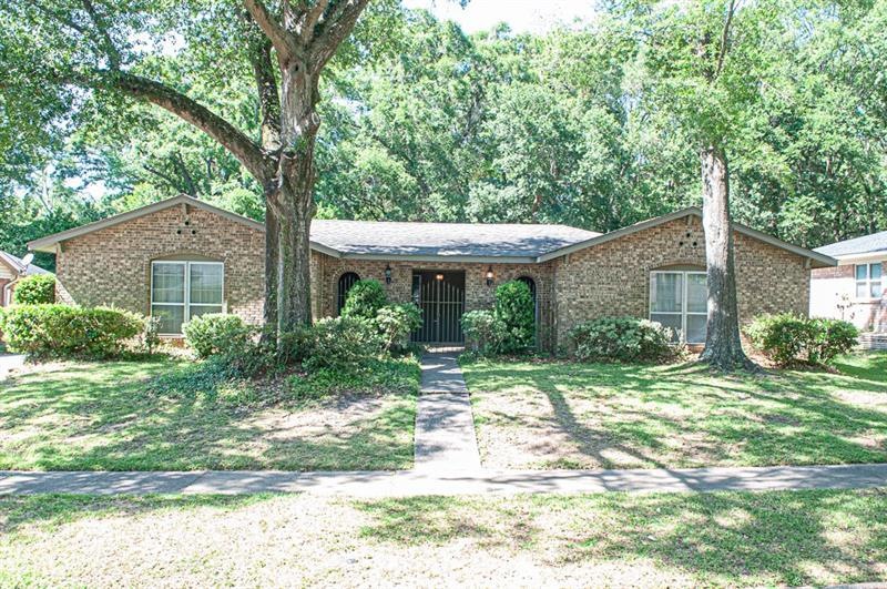 All brick exterior with private courtyard