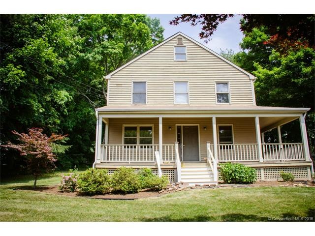 A pretty reproduction farmhouse with great curb ap
