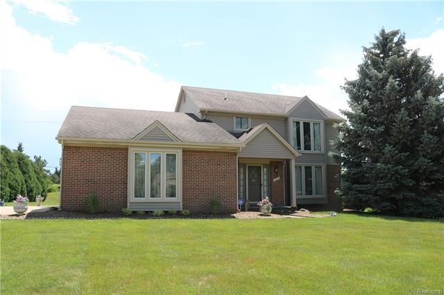 THIS 2,159 SQ FT BRICK COLONIAL IS LOCATED IN 
