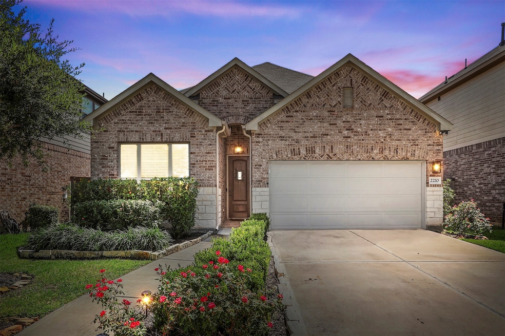 Welcome home! This charming brick exterior is fram