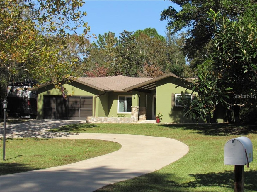 Curb appeal abounds in this lovely Woodlands home!