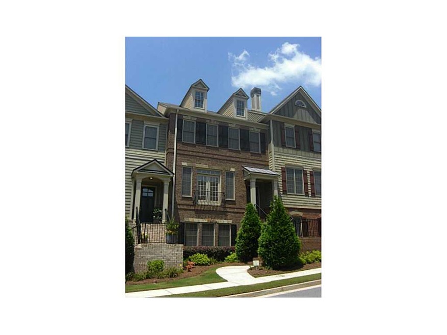 Exterior Front. Beautiful brick townhome in sought