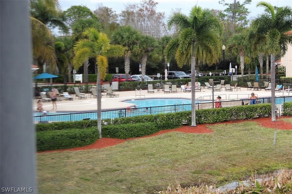 VIEW FROM YOUR LANAI.  COMMUNITY POOL IS ONLY STEP