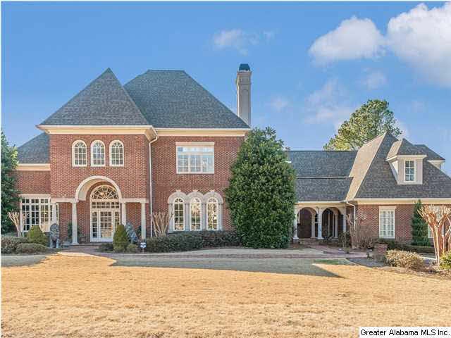 Beautiful custom built 4 side brick home in gated 