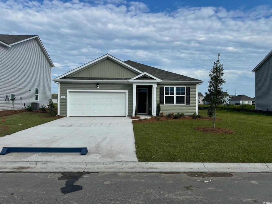 View of front of home featuring central AC unit, a