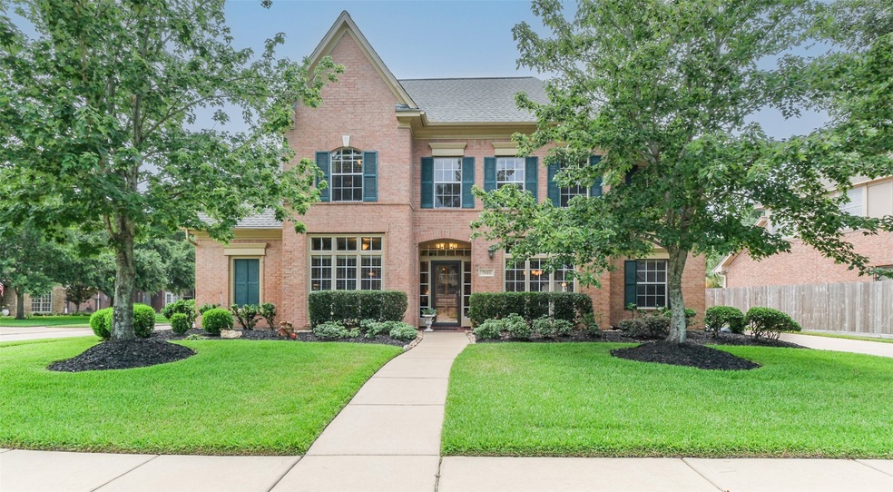 7903 Emerald Bluff Ct, Houston, TX 77095 - photo 1