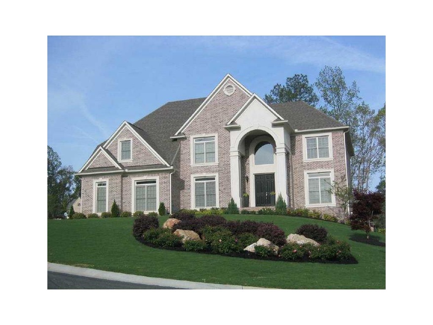 Exterior Front. Beautiful 3 sided brick home in Jo