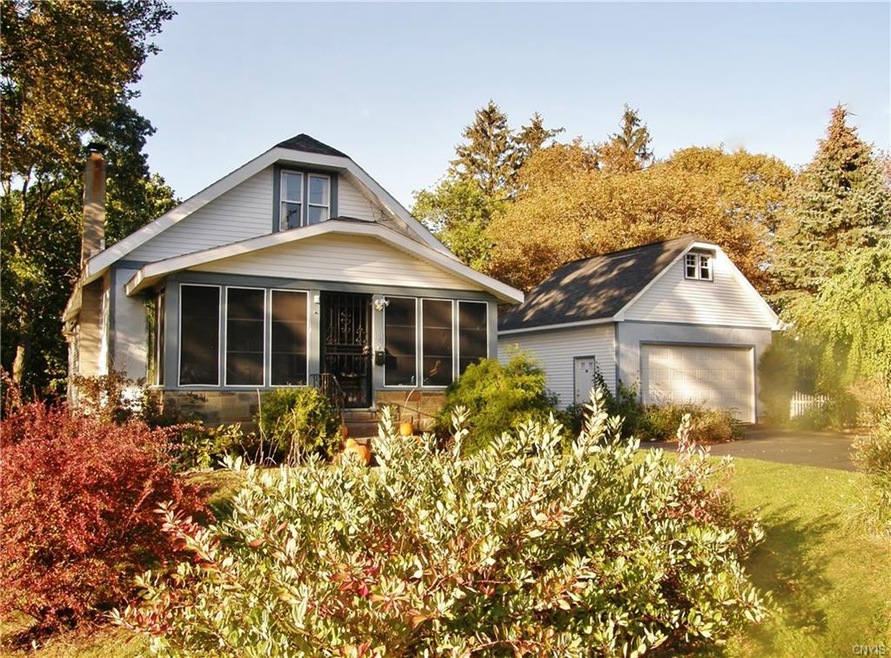 Mature plantings and a double lot give this home g