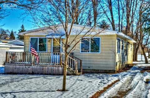 610 Cherry St, Clio, MI 48420 - photo 1