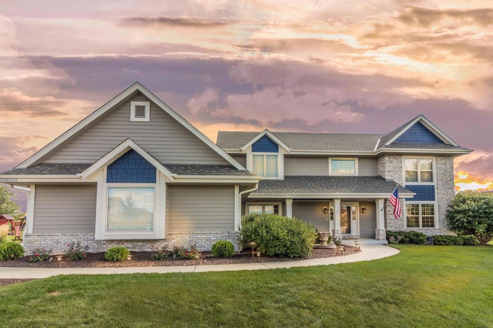 W134N6230 Windrift Pass, Menomonee Falls, WI 53051 - photo 1