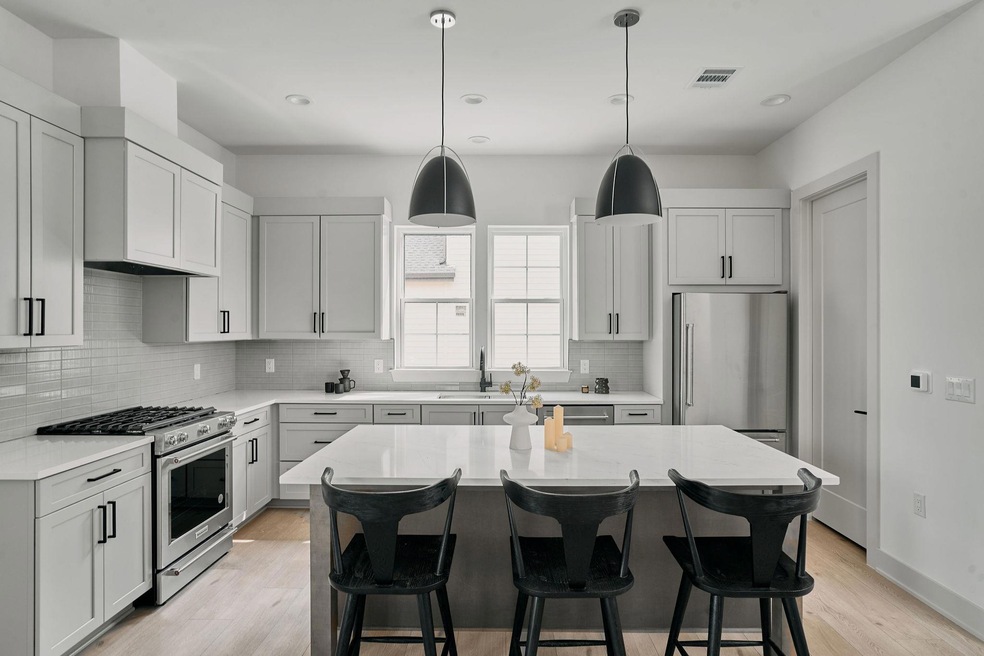 Kitchen featuring a sink, stainless steel applian