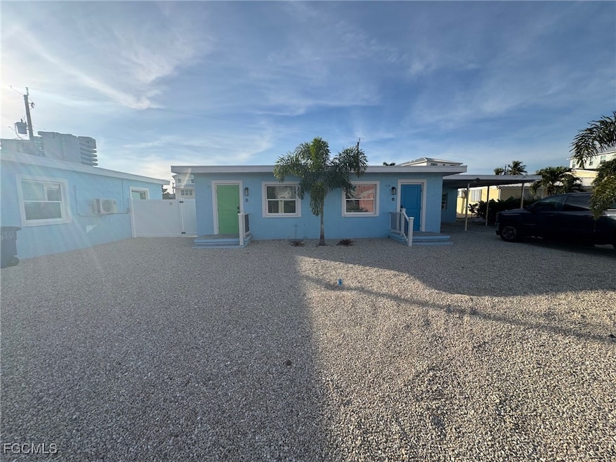 View of front facade with stucco siding