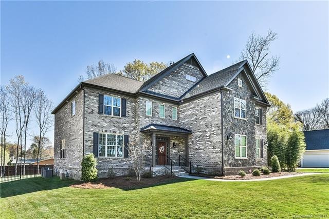 Custom brick home with lovely flat lot