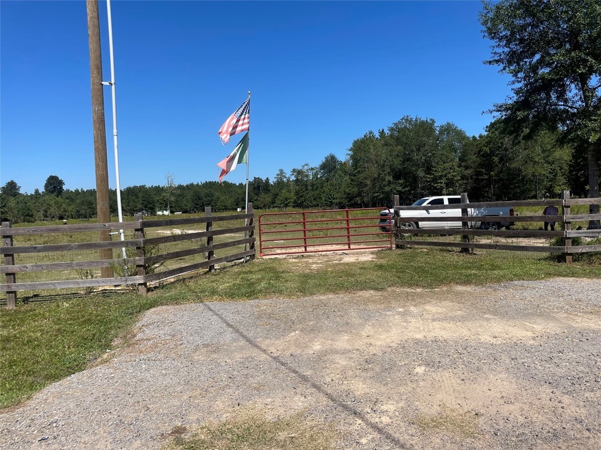Welcome to 6635 Brown Rd! The property has a gated