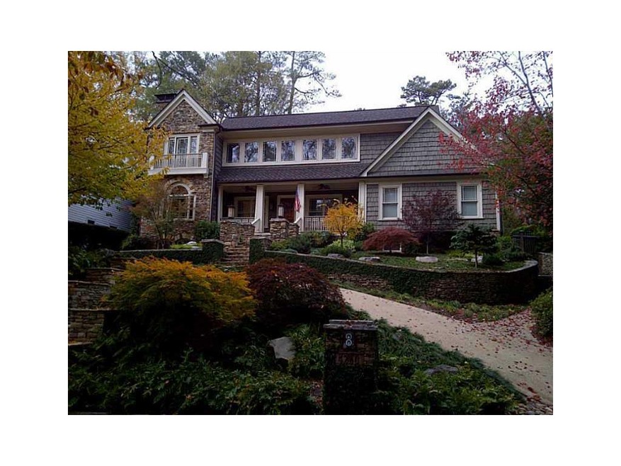Exterior Front. A beautifully landscaped front yar