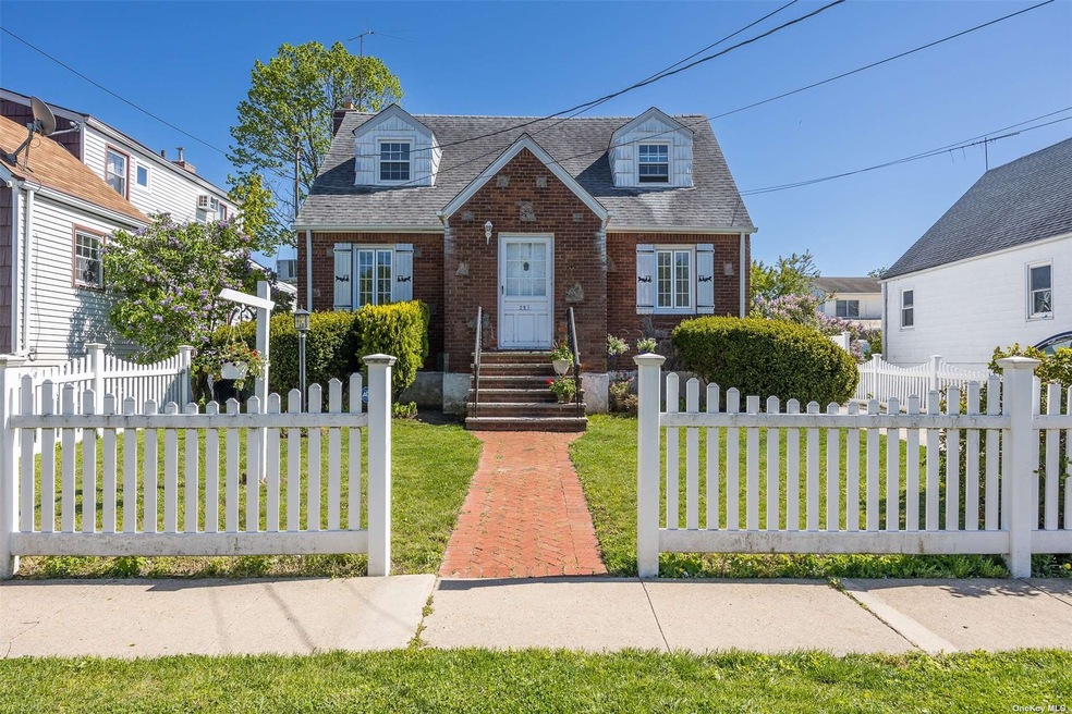 Story Book Charmer with White Picket Fence