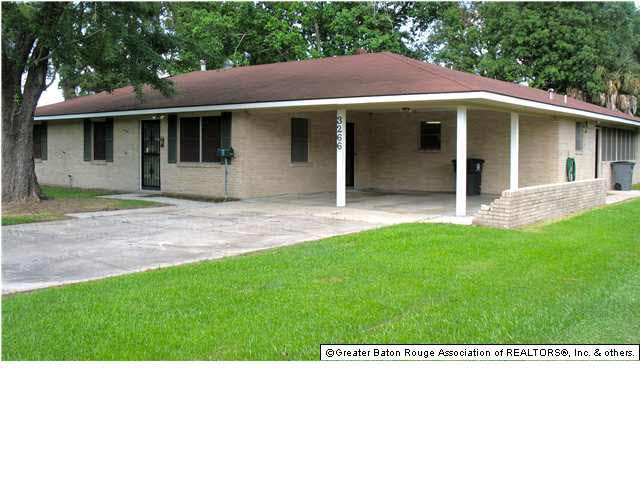 Double carport and king size screened room