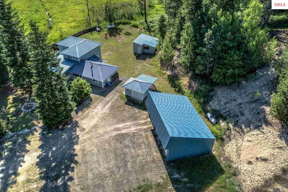 Shop, insulated pump house, 3 car garage