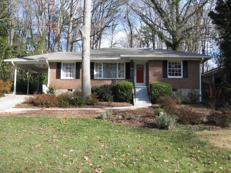 Exterior Front. Well-maintained brick ranch sits u