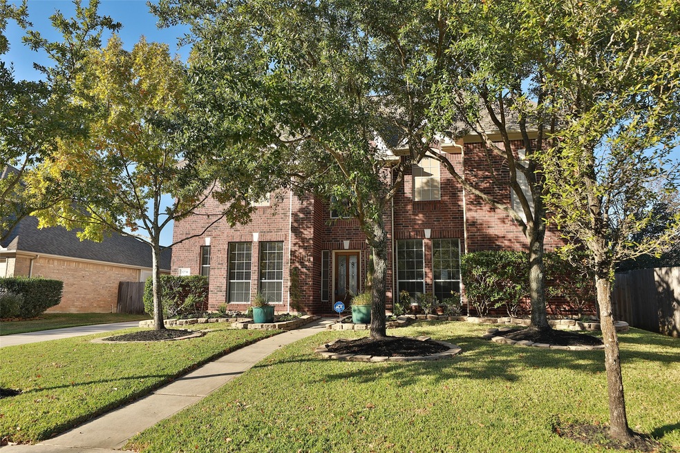 Welcome home!  Red brick and nicely landscaped front yard.