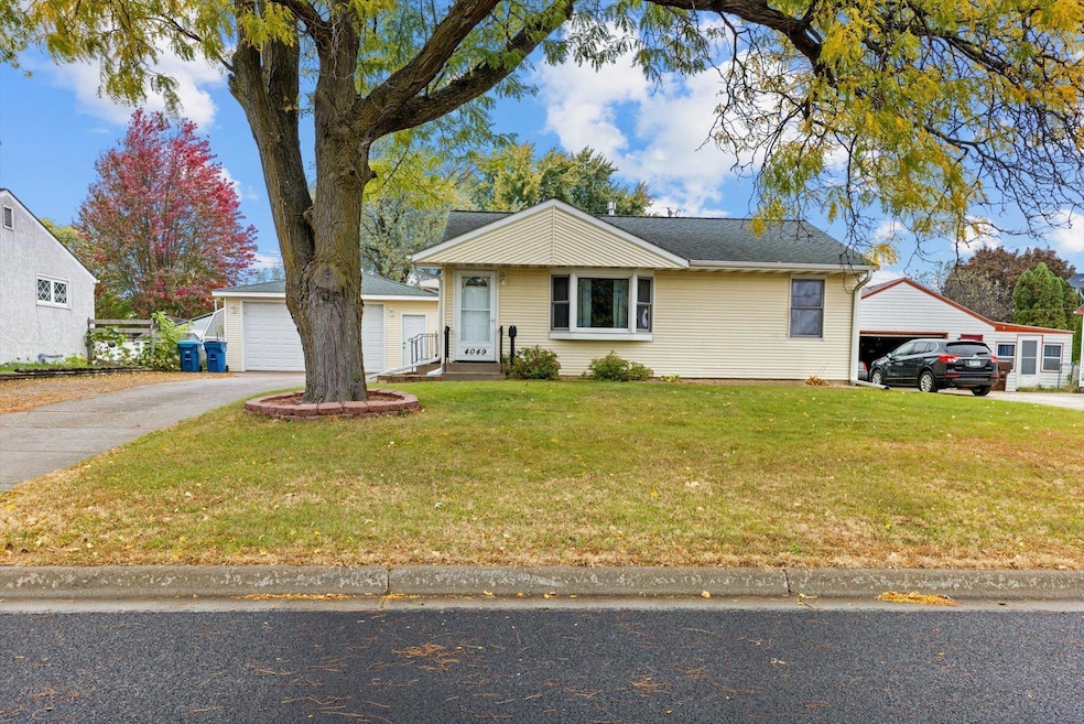 Welcome to 4049 75th St E Inver Grove Heights Minnesota! Beautiful concrete driveway and extra parking strip to the side with a huge 2 car garage!, Street parking and beautiful curb appeal!