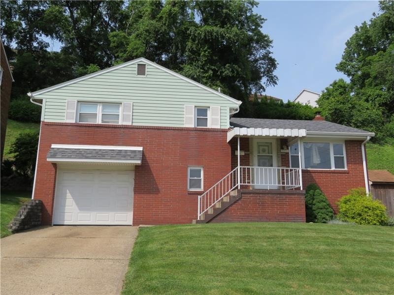 Great curb appeal with newer windows, roof, mechan