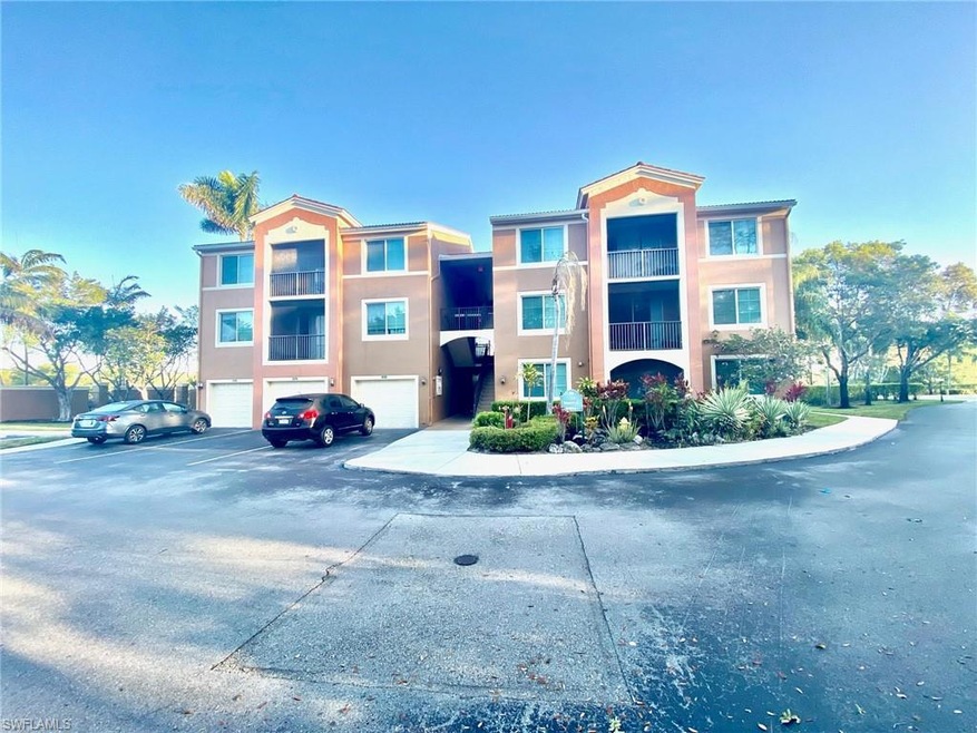 View of property with an attached garage