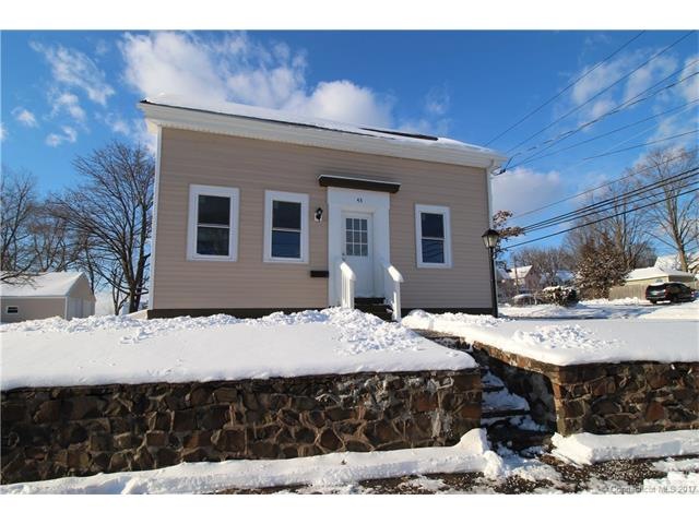 All redone from studs in...new siding, new windows