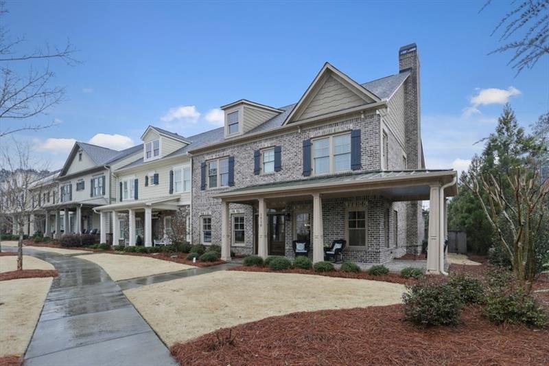 Gorgeous End Unit with Wrap Around Brick Porch!