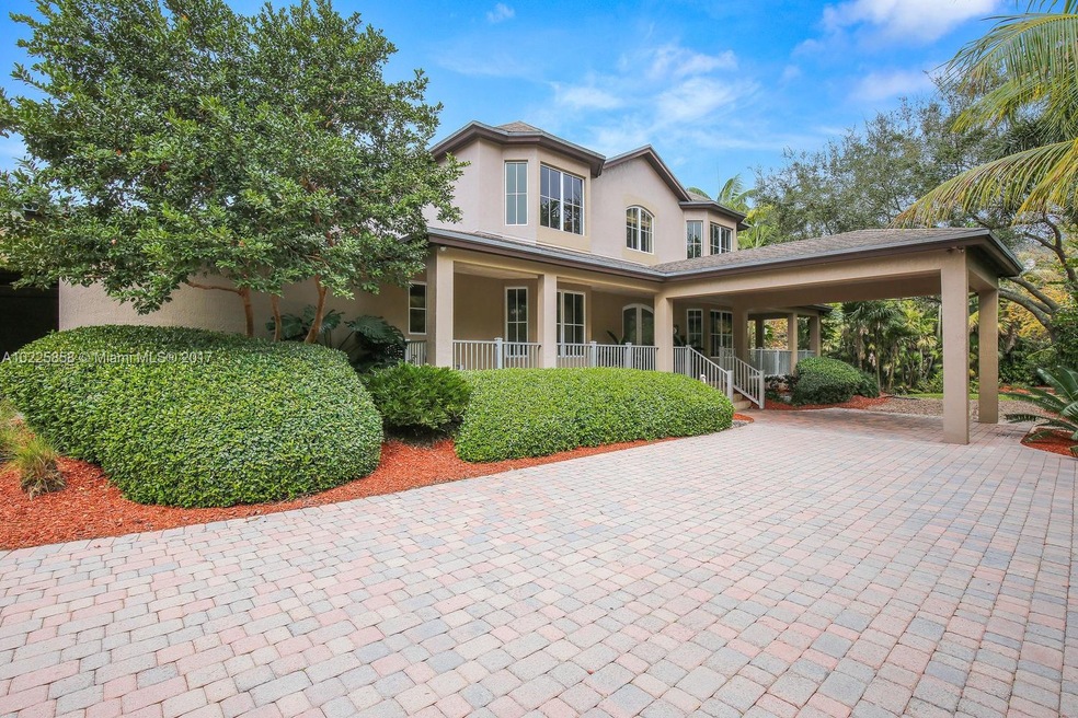 FRONT ENTRANCE W/ PORTE COCHERE