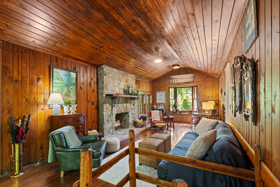 Welcome to the most Picturesque and Private Cabin in all of Williamson County! The center of the cabin w/ a soaring vaulted ceiling & a massive stone fireplace anchor the space w/ rustic charm & windows frame peaceful views of the surrounding woods.