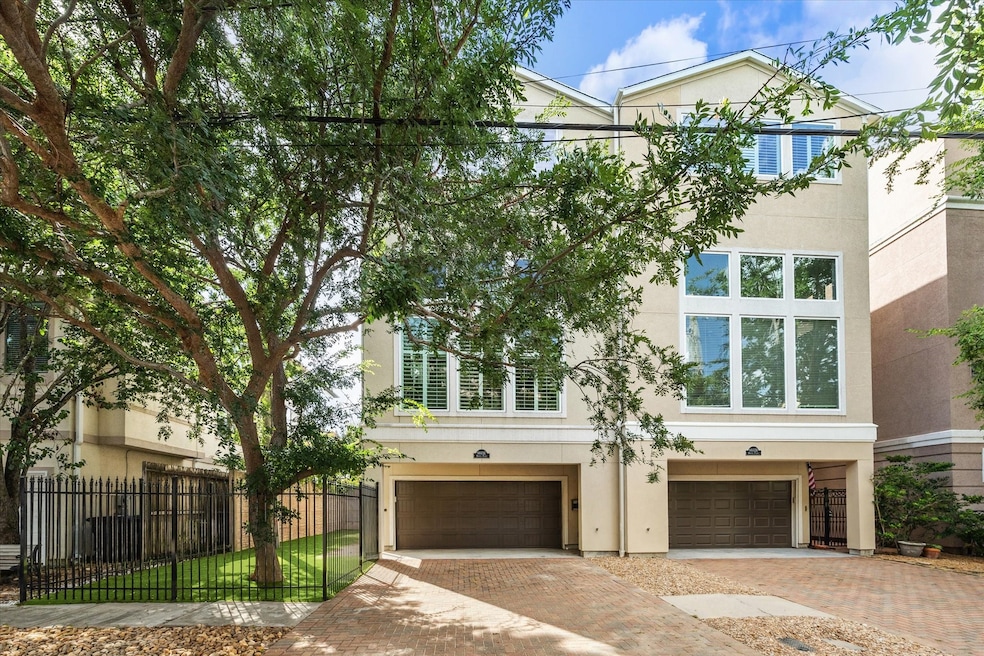 Just steps from Memorial Park, this sophisticated